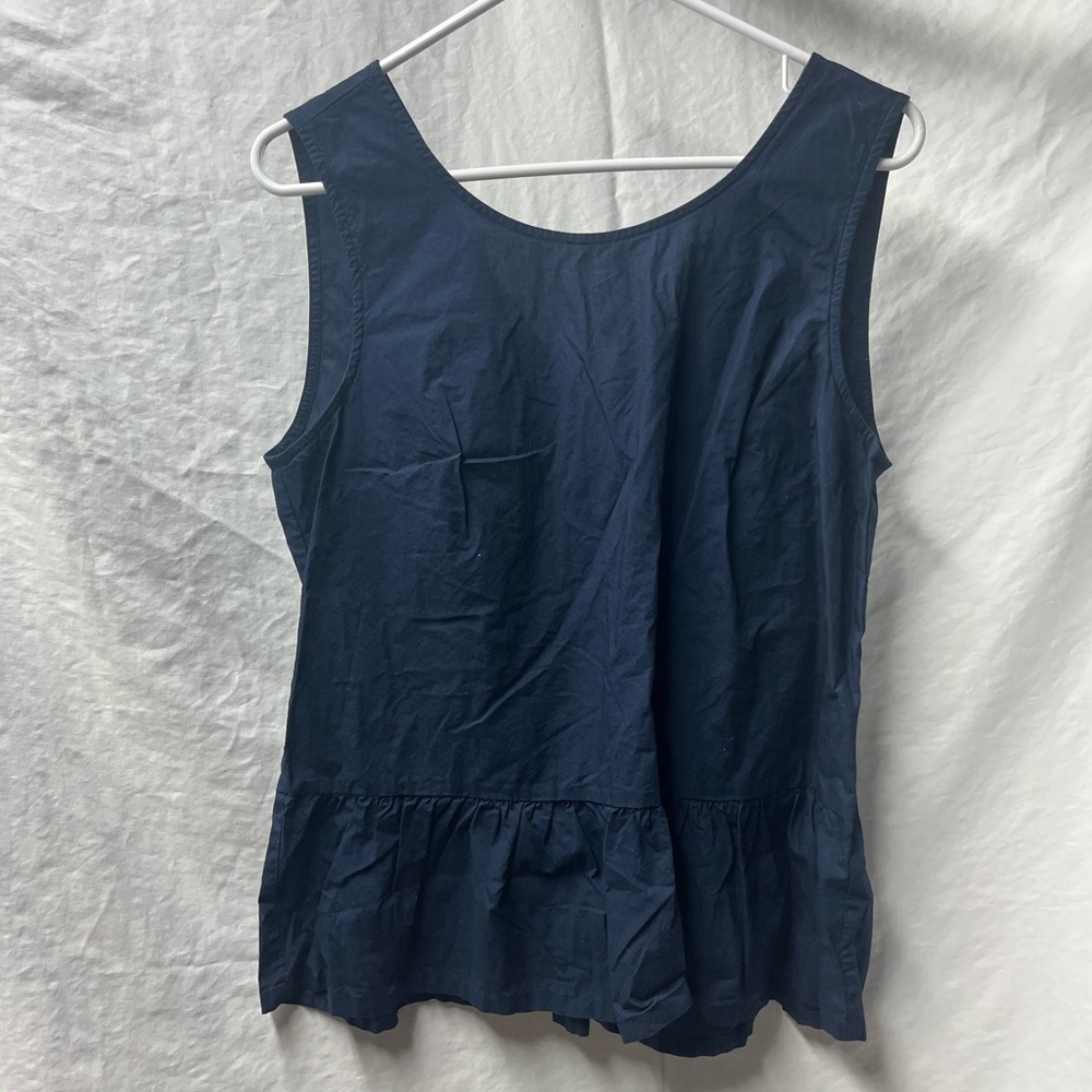 Gorgeous navy blue top from j core! Check out the back for a stunning bow look